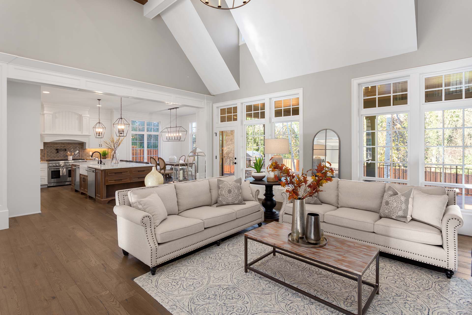 Living room and kitchen in new traditional style uxury home.