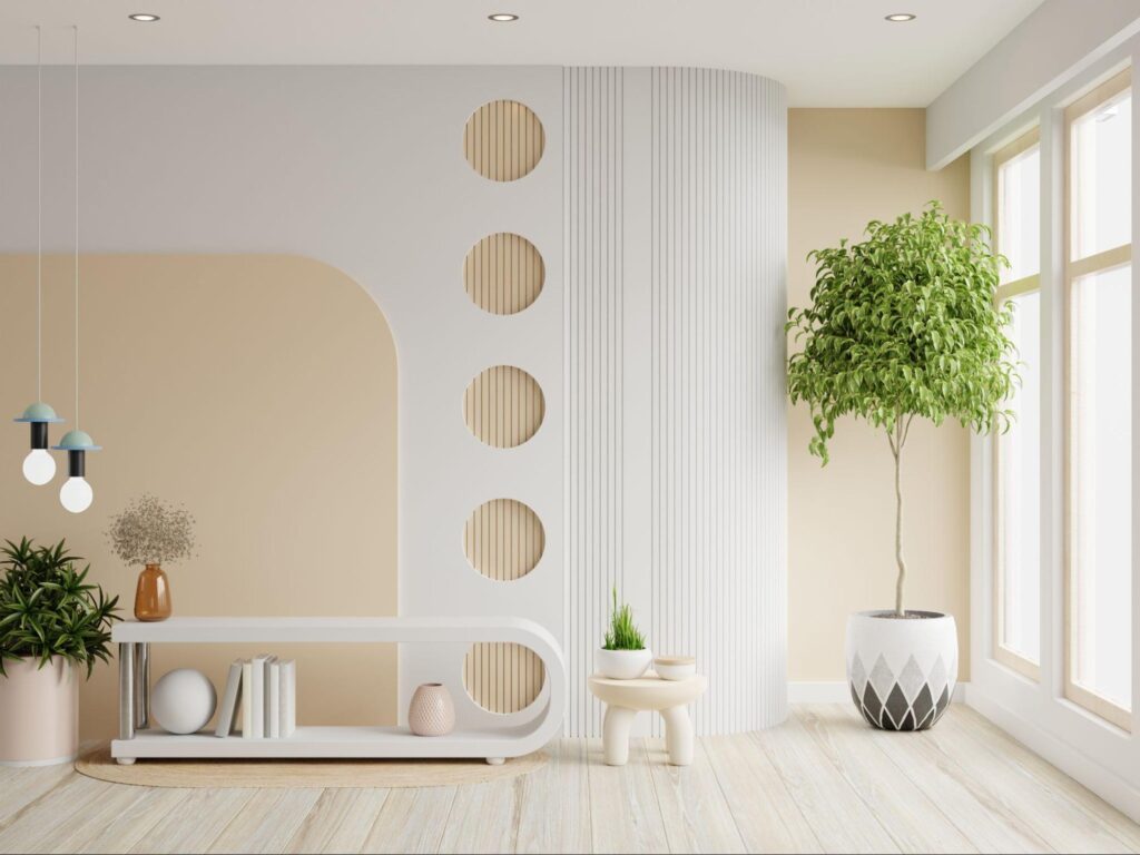 A mockup of a two-tone color wall as a living room decor featuring a TV cabinet, low-hanging lights, various decorative elements, and plants.